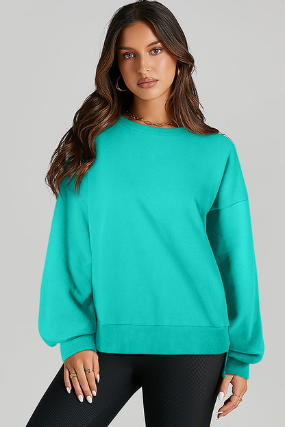 Aruba Blue Solid O Neck High Low Hem Pullover Sweatshirt