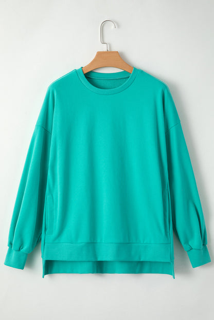 Aruba Blue Solid O Neck High Low Hem Pullover Sweatshirt