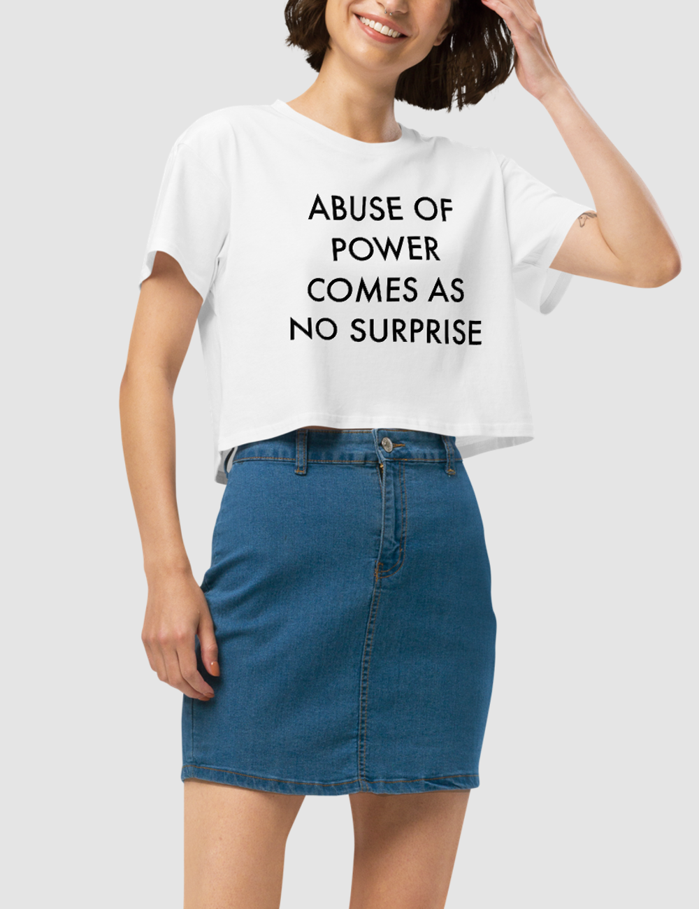 Abuse Of Power Comes As No Surprise Women's Relaxed Crop Top T-Shirt OniTakai
